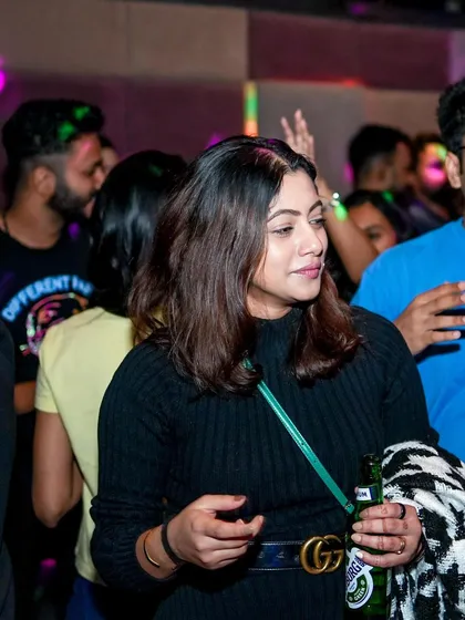 A guest enjoying a beer and the music.