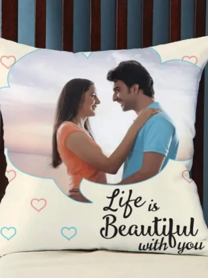 A classic personalized photo cushion is a simple yet heartfelt gift for your partner. This one features a romantic photo framed by a sweet "Life is Beautiful with you" message, perfect for any anniversary or special occasion.