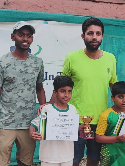 Our coaching team with the next generation of champions.