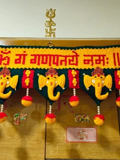 It brings me so much joy to see my creations in your homes. This is my Ganpati toran hanging beautifully on a customer's door, ready for the festival. Thank you for sharing this wonderful photo with me.