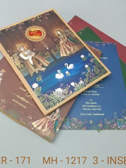 This card depicts a beautiful scene of Radha and Krishna by a lake with swans. The invitation set comes with multiple inserts in different colors to match your wedding theme.