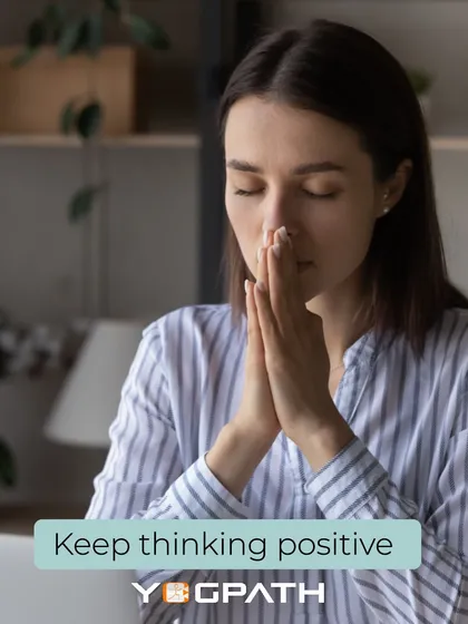 A simple yet powerful reminder to keep thinking positive. This image shows a woman in a moment of quiet reflection, a state that can be cultivated through regular meditation and pranayama practice.