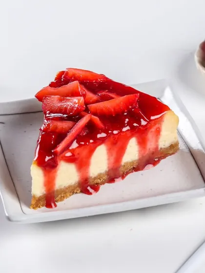 My Strawberry Cheesecake slice is a seasonal favourite. It's topped with a homemade strawberry compote that is both sweet and tangy.