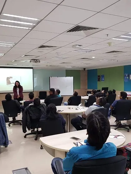 A view from the back of the room during a corporate training. It's rewarding to see a team fully engaged and invested in their professional development.
