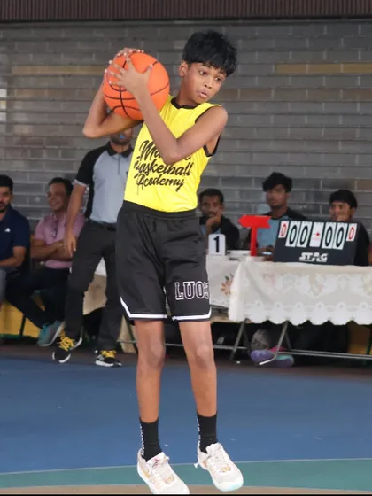 A player jumps for a shot during a drill. We focus on building the strength and technique needed for a powerful and accurate jump shot.