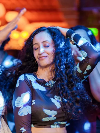 Another guest lost in the moment, dancing to a timeless track.