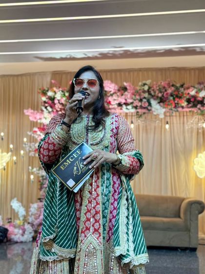 On stage during the Tapasvi Anumodna. My role here was to guide the proceedings with grace and ensure the significance of the occasion was beautifully communicated.