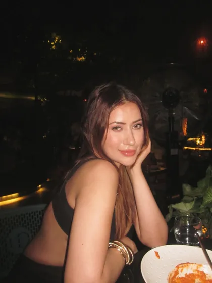 Dinner is served. This close-up shot shows the soft, glowing makeup I paired with my black cutout dress.