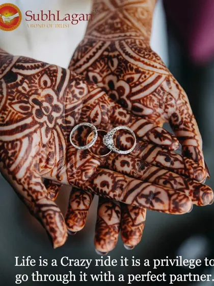Wedding rings rest in the bride's henna-covered palms, a beautiful symbol of union. Life is a crazy ride, and we help you find the perfect partner to share it with.