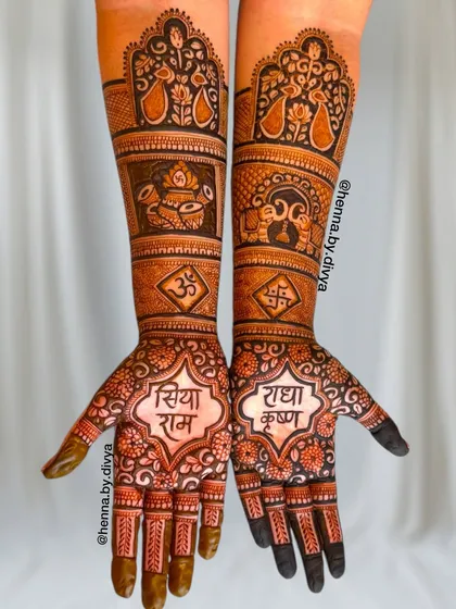This is a full bridal mehendi design that blends devotion with intricate traditional patterns. The palms feature "Siya Ram" and "Radha Krishna" in beautiful calligraphy, surrounded by auspicious symbols like the kalash, Om, and swastika, extending up the forearms.