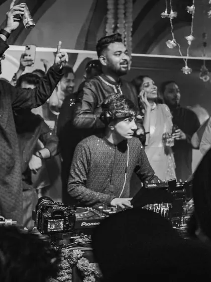 A classic black and white moment from a great night. Even without color, you can feel the energy and joy from the crowd as they celebrate and dance.