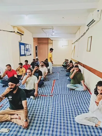 Students practicing pranayama (breathing exercises) during our special session for National Maritime Day. Conscious breathing is a powerful tool for managing stress in high-pressure environments.