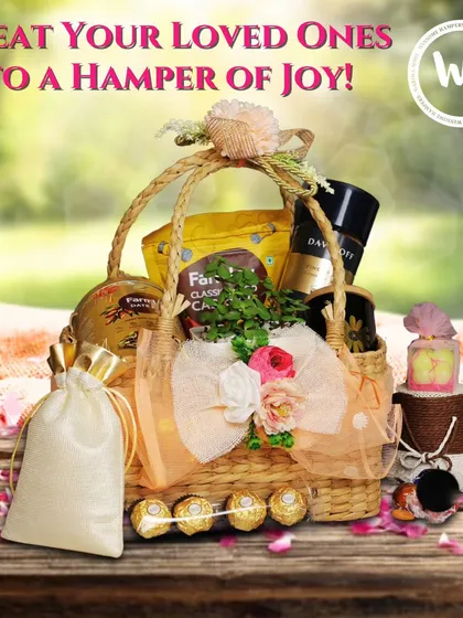 Treat your loved ones to a hamper of joy. This beautiful wicker basket is filled with gourmet coffee, premium snacks, Ferrero Rocher chocolates, and a scented candle, making it a perfect all-occasion luxury gift.