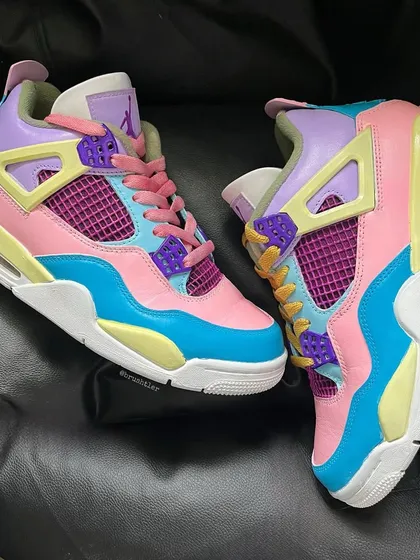 Another angle of the colorful, upcycled Jordan 4 sneakers.