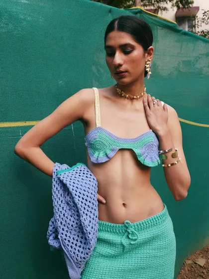A summery look featuring a crochet bralette and skirt. This demonstrates my styling for younger, trend-focused brands with a playful aesthetic.