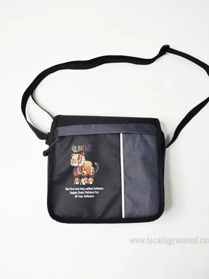A custom sling bag with a unique printed design for our client Lineage. This shows our capability to go beyond simple logos for full customization.