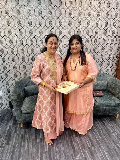 Presenting a small token of our appreciation to a guest. Hospitality is at the heart of what we do.