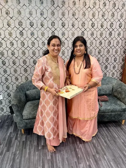 Presenting a small gift to one of our honored guests as a token of our appreciation.