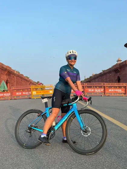 A female rider with her stunning Cervelo bike.