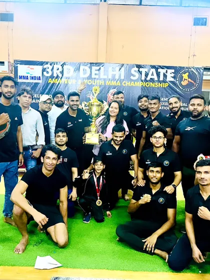 Victory feels best when shared with your parivaar. This is our team celebrating with the first prize trophy at the 3rd Delhi State Amateur & Youth MMA Championship. We came, we fought, and we conquered together, bringing home 8 gold medals.