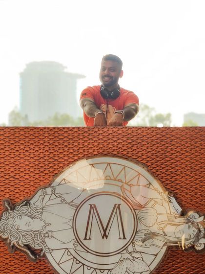 A happy moment captured at Mirage. The rooftop setting with the city in the background is one of my favorite places to play.