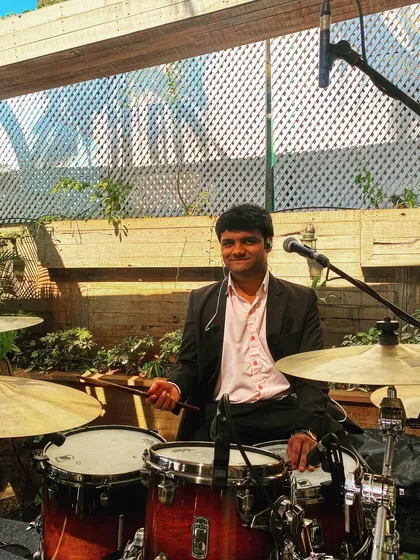 Our drummer Leander, all set up and ready for a daytime gig. Even in a more relaxed setting, he's the anchor of our rhythm.