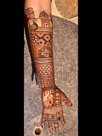 A single arm of a traditional bridal design, showcasing a beautiful portrait of the bride.