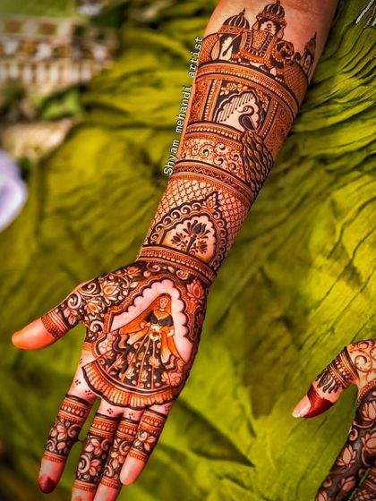 A close-up of the previous design, highlighting the dancing woman portrait and peacock motifs.