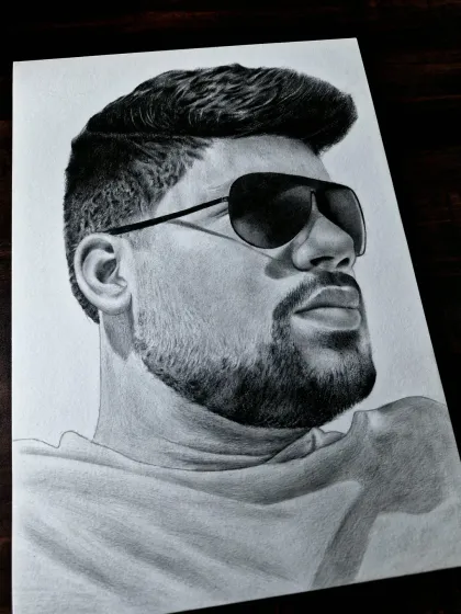 This is an example of a modern male portrait. I focused on the play of light and shadow, especially on the sunglasses, to give this commissioned sketch a cool, contemporary feel.