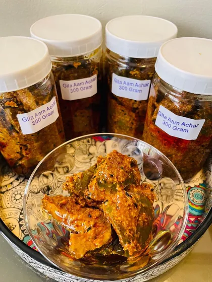 It's mango season, which means it's time for my classic North Indian style Aam ka Achaar. This is the spicy version, also called Gila Aam Achar, made with raw mango chunks and a blend of traditional spices.
