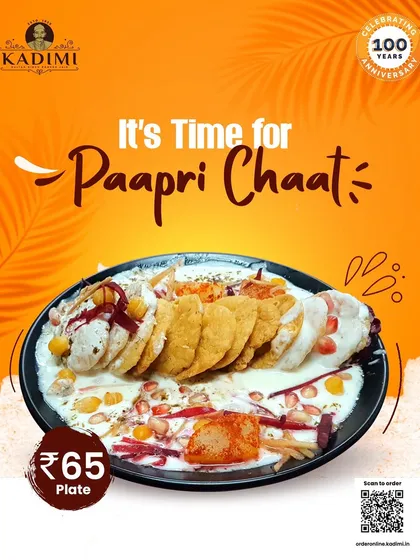 Tangy and Sweet Paapri Chaat. A delightful street food classic, our Paapri Chaat is a mix of crispy wafers, potatoes, chickpeas, and yogurt, topped with sweet and tangy chutneys.