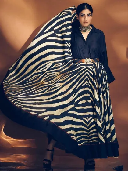 Working with the iconic Raveena Tandon is always a dream. For this editorial shoot, we created a chic, textured low ponytail that contrasted beautifully with the dramatic flow of her JJ Valaya skirt.