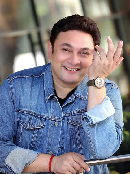 Rajesh Kumar in a classic denim jacket. This casual, confident look adds another dimension to his portfolio, showing his versatility.