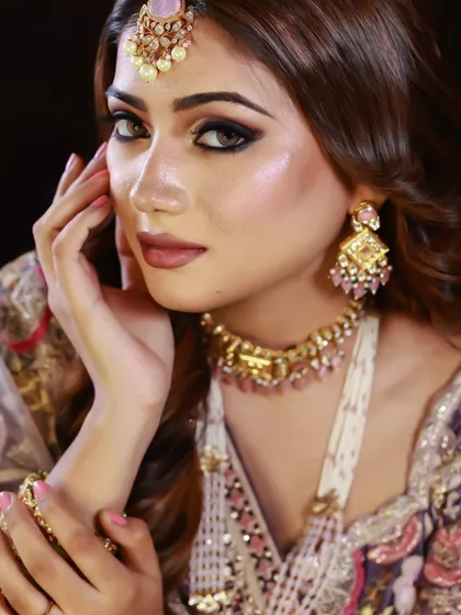 A close-up on the eye makeup, showing the detailed blending of purple eyeshadows.