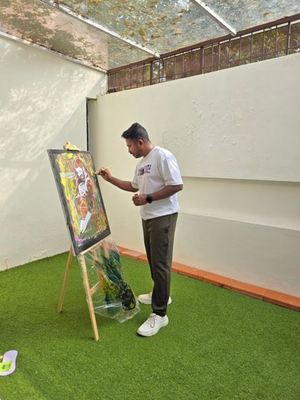 From a wider angle, you can see how I work during an event. The process is quiet and unobtrusive, but it adds an element of creative entertainment for everyone attending.