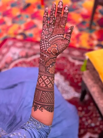 Here you can see the beautiful, deep reddish-brown stain my organic henna leaves after a day. I guarantee a rich, dark color for every client, ensuring your mehndi looks stunning for your special occasion.