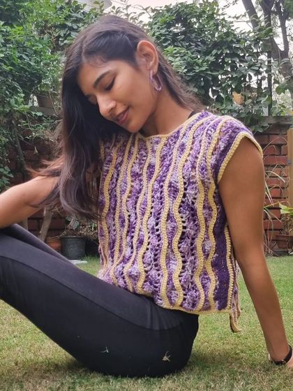 Feeling thoughtful in my handmade top. Experimenting with colors I don't usually wear, like this purple, has been such a rewarding part of my creative journey.