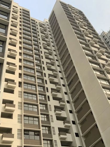 An exterior view of the high-rise apartment building where we conduct pre-handover consultations, helping clients safeguard their investment.