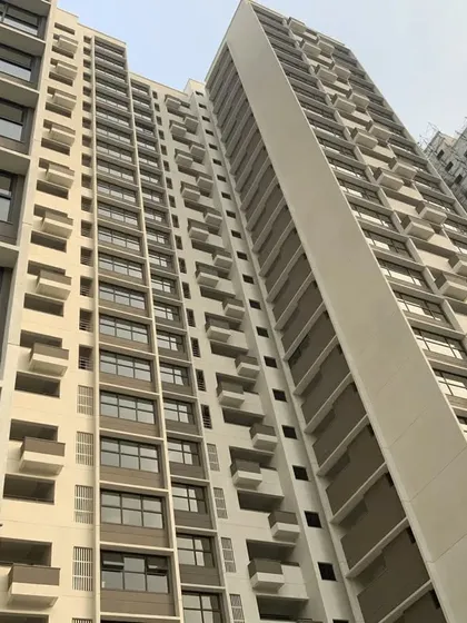 An exterior view of the high-rise apartment building where we conduct pre-handover consultations, helping clients safeguard their investment.