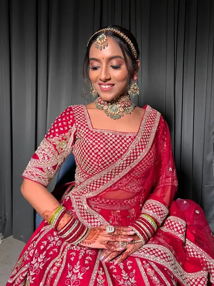 A close-up of Apurva's smiling face, her makeup looking fresh and flawless.