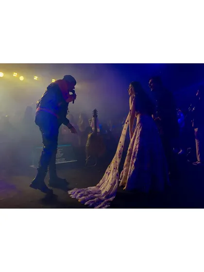 Jubin Nautiyal performs at Khushboo and Varddan's engagement, with the couple enjoying the music. The energy of a live performance adds an incredible atmosphere to any celebration.