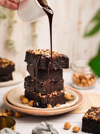 Capturing the perfect action shot is a thrill. For this hazelnut brownie, I wanted to show its rich, gooey texture. The pouring chocolate sauce creates a dynamic and irresistible image that makes you want to grab a spoon.