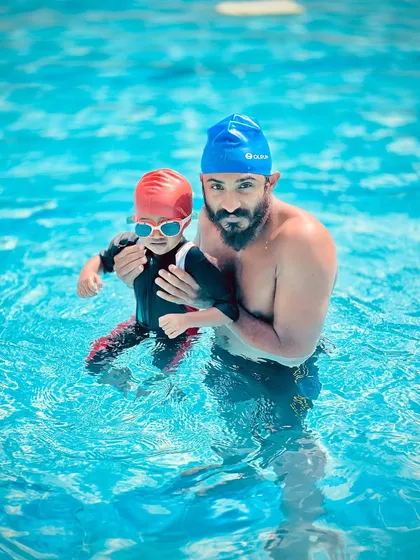 Our infant swimming program is designed to be a gentle and positive first introduction to the water. A coach is always there to guide and support our tiniest swimmers.