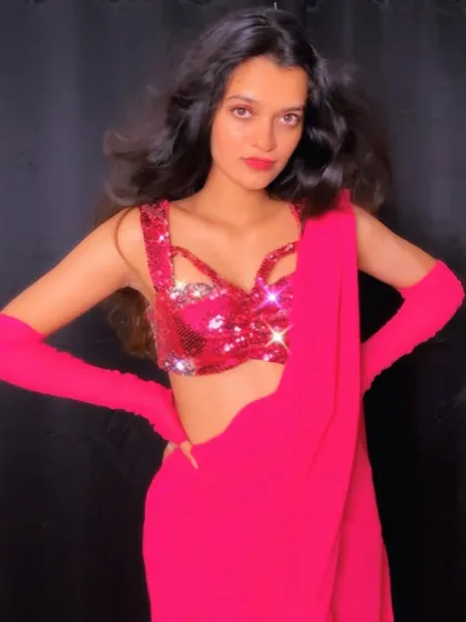 A photoshoot inspired by the iconic saree looks of Bollywood. I draw inspiration from films for both my choreography and my personal style.