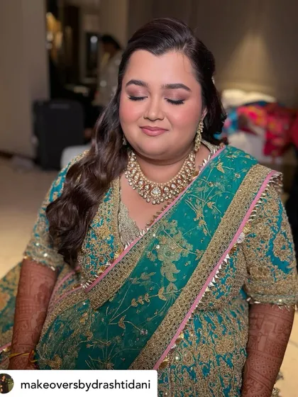 A beautiful Sangeet look for this bride. I created a soft smokey eye with a neutral color palette to complement her ornate teal and gold lehenga.
