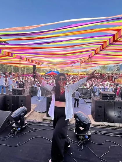 Commanding the stage at the 'Holi High' festival in Mumbai. I thrive on the energy of large crowds and know how to make public events unforgettable.