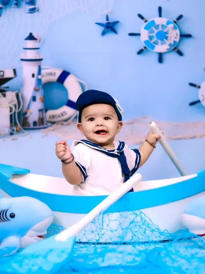 This little sailor is cheering with excitement during his nautical adventure.