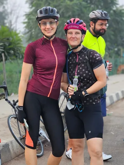 Two members sharing a friendly moment during a ride.