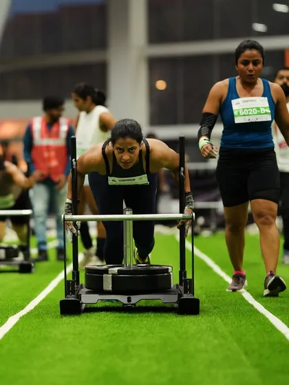A shot of me mid-sled push during a competition. This is one of the toughest events and requires pure leg drive and mental toughness.