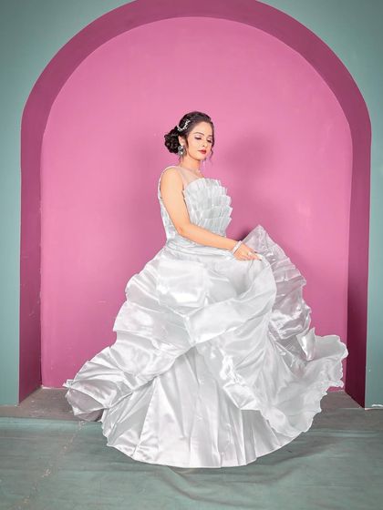 The movement of this gown is spectacular. Renting this piece allows you to have a high-impact look for your photos without the high cost.